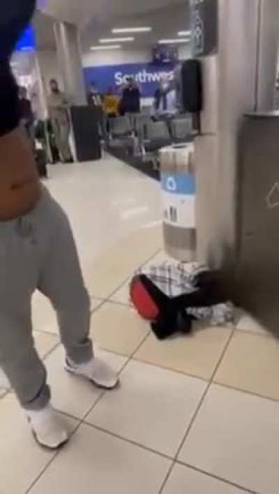 Guy attacks an airline worker