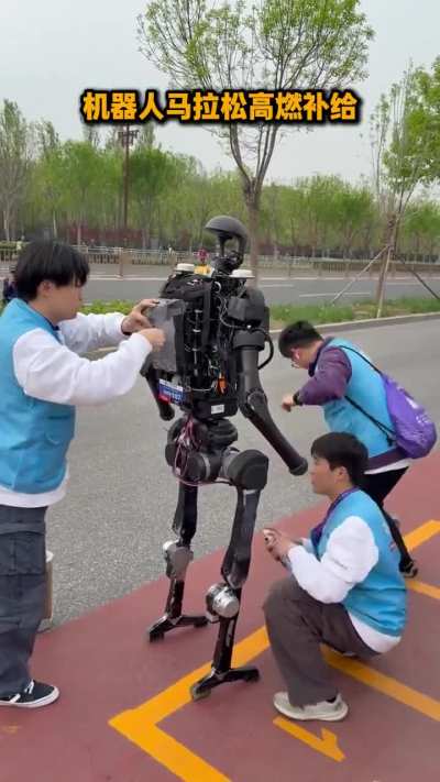 Pit stop at Robot half marathon in Beijing. Ice to cool down the battery and lubricant for the joints