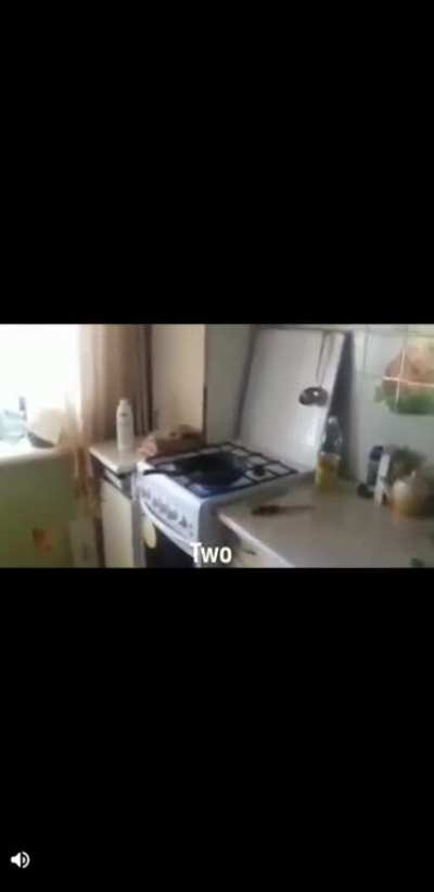 Throwing a cup of water at boiling oil
