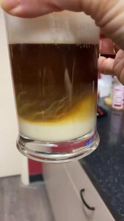 Mesmerizing wave patterns of settled oat milk in my latte