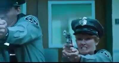 In Blade (1998) the policeman tell Blade to freeze and he turns without resisting however after seeing he is a black man the police fires at him