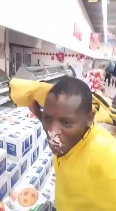 Guy videos himself looting local supermarket during South African riots