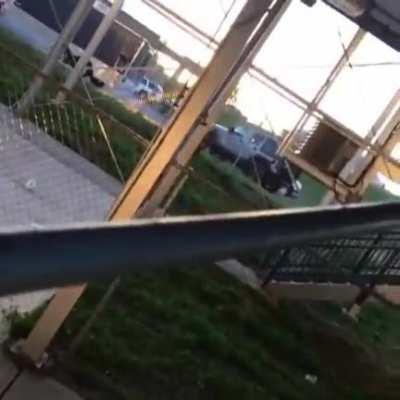 Climbing a fence with one hand!
