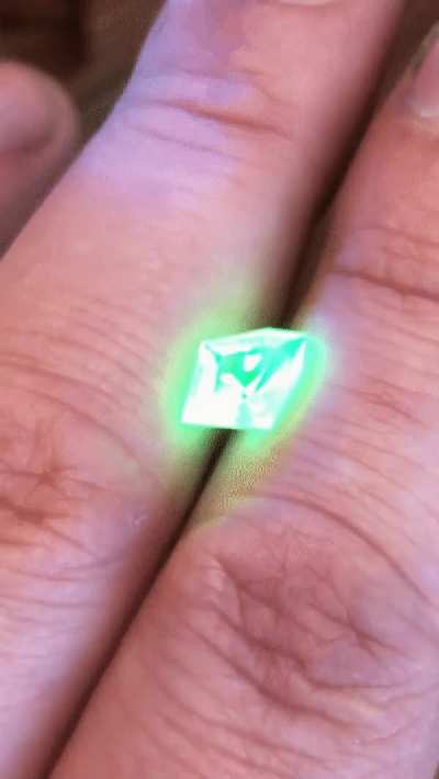 Uranium in this Hyalite Opal causes it to glow green when exposed to UV light.