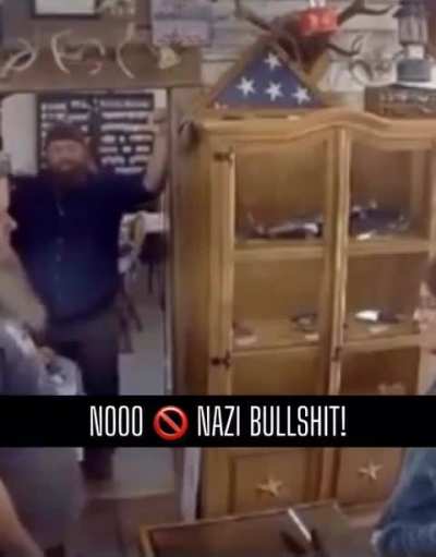 He refuses to add nazi emblem.