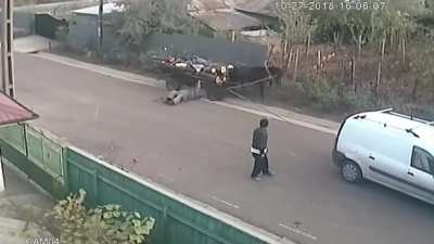 Guy standing in the middle of the road