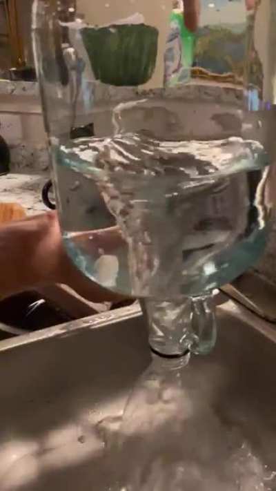 My wife and I love cleaning out our wine jugs this way. Wait for the tornado.