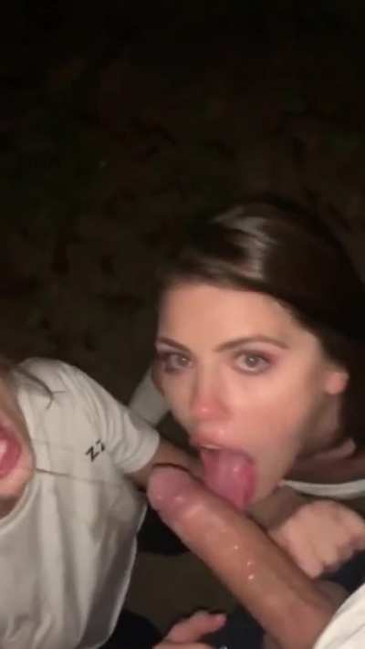 Two friends on one dick in public