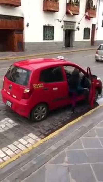 In Cuzco, Peru it’s apparently perfectly normal to take a taxi with your Llama