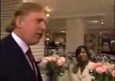 Donald Trump motorboating his former lawyer, Rudy Guiliani, in drag