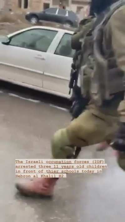 Occupation soldiers arresting (IMO kidnapping) three 11 year olds right infront of their schools today in Hebron