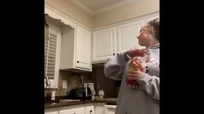 Shaking a ketchup bottle