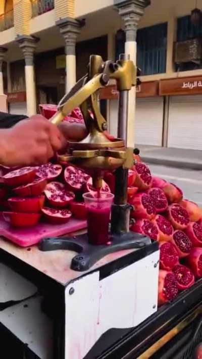 This heavenly elixir of pomegranate juice in the streets of Baghdad, Iraq.