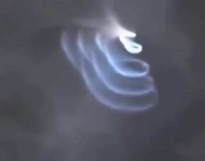 SpaceX Falcon 9 pulsing its cold-gas attitude-control thrusters as it returns to Earth