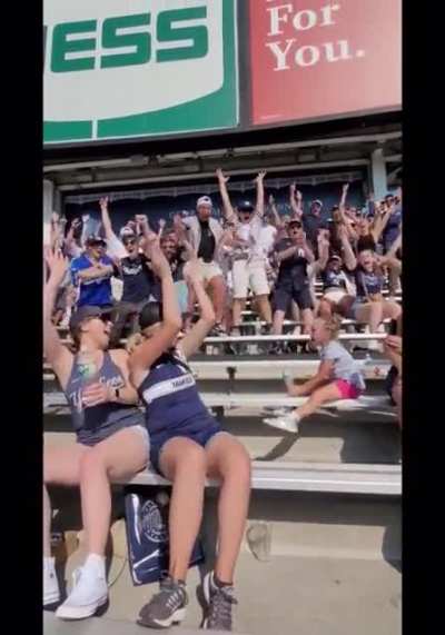 Bleacher creatures go wild for kid’s bottle flip.