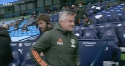 The change in Ole's expression after fist bumping Pep before the match