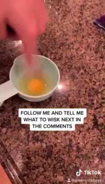Barry Allen whisking egg