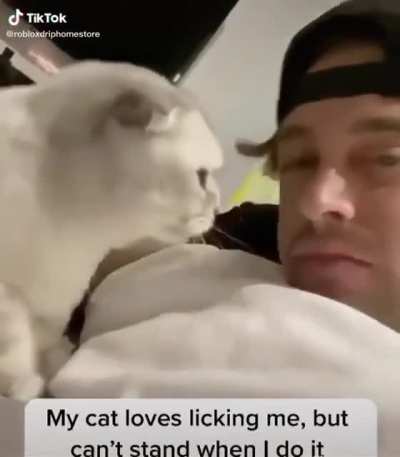 Guess cats dont like to be licked