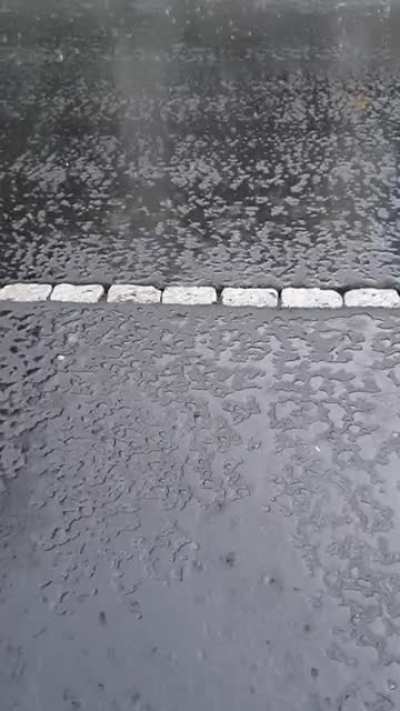 Rain on some freshly paved asphalt, feat. umbrella noises