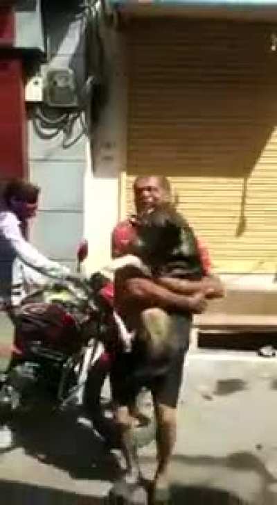 Indian drunk guys celebrating the holi festival