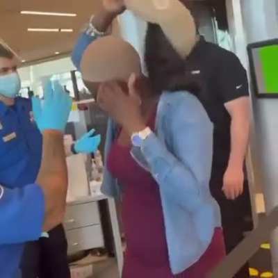 Ma‘am, please take your hat off
