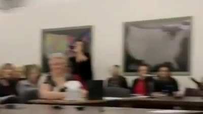 A farmer in Nebraska asking a pro-fracking committee member to honor his word of drinking water from a fracking location