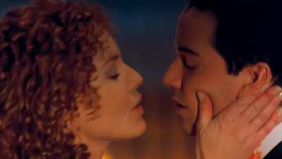 Redhead Connie Nielsen exposes body in celebs video scene from The Devil's Advocate