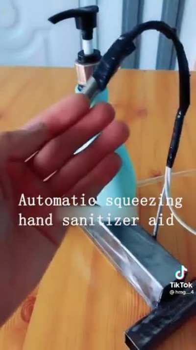 Automatic squeezing hand sanitizer