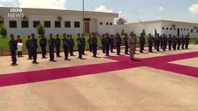 The Libyan military band playing the UK national anthem for Boris Johnson