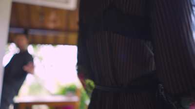 Step-daughter play with Daddy behind her Mom back