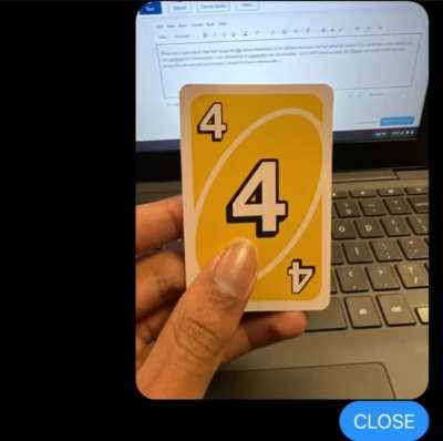 Me playing an uno match at school