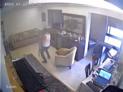 Dad protects his son after the Beirut explosion today