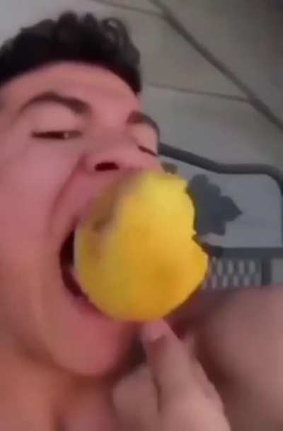 Mango on a fork.