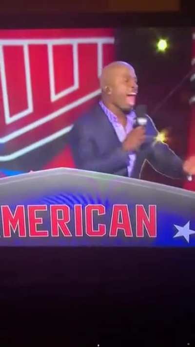 Ninja Warrior contestant in a 3 piece suit
