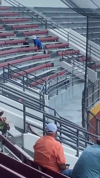 Angry dude yelling at the umpire knees give out while walking down some steps 