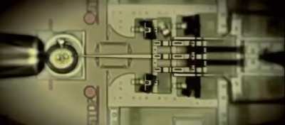 Nano Injector injecting DNA into a cell