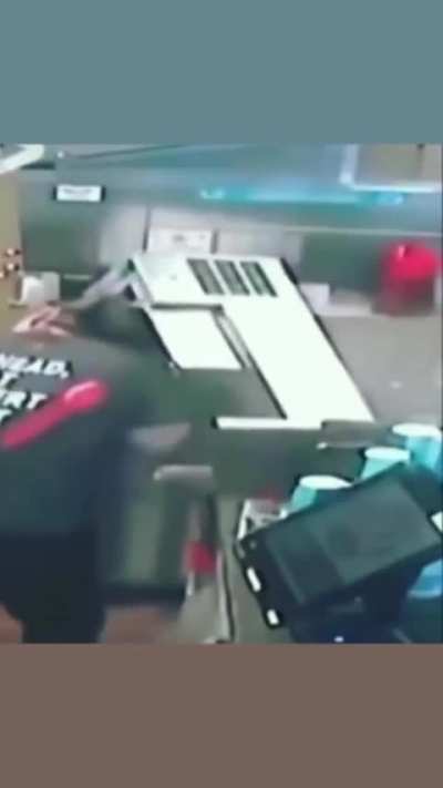 Dairy Queen worker's hair gets caught in the blizzard machine.