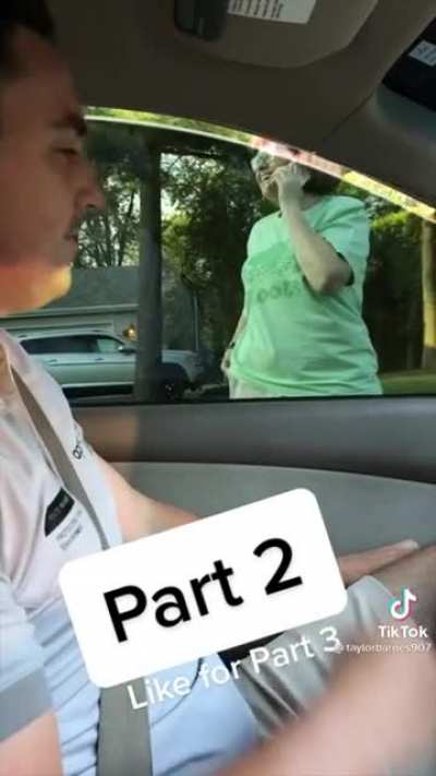 Old lady has a problem with these guys working in her neighborhood. They seem unfazed.