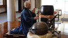 Buddhist monk performing cover of 