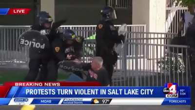 This is so fucked...... an elderly man with a cane !! Shoved to the ground ?!? And then picked up and trying to help ? Insane man ....