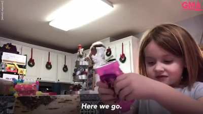 dad hysterically dances as the daughter does art and craft for virtual school