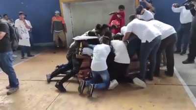 This is Oaxaca in Mexico. A 16 year old young man named Alexander was murdered by Municipal Police. Soccer was his passion. This is how his teammates and family honored him. One final goal, this is amazing!
