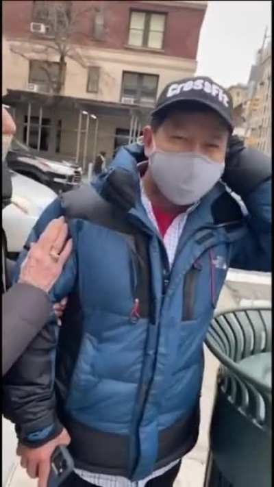 Bystanders step in to protect Asian man who who was body slammed into a glass storefront in NYC.