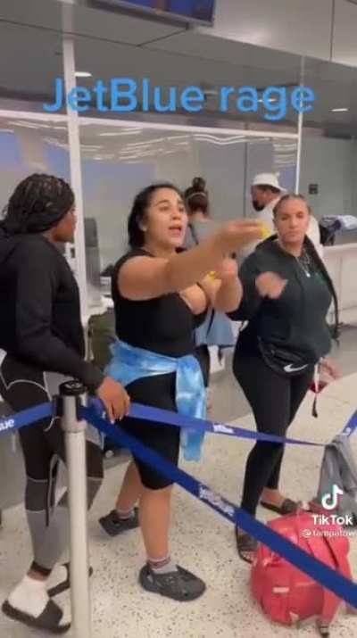 Black woman defends older white man after ANOTHER woman calls him a racist slur.
