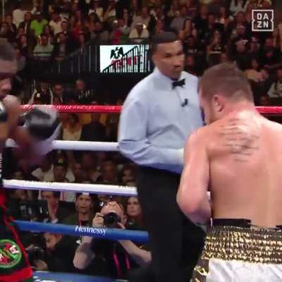 to hit the guy with green gloves