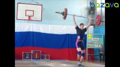 Guy steals barbell during weightlifting competition