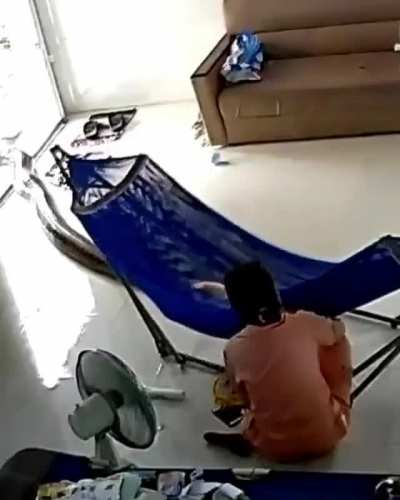 A mother’s and a baby’s nap disturbed by a large snake