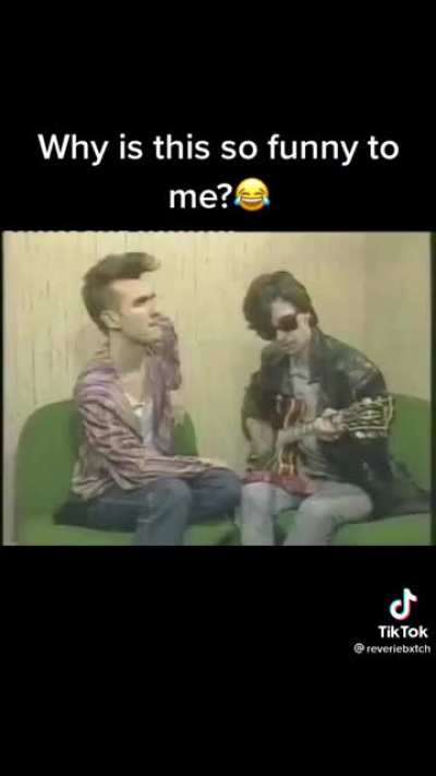 Morrissey looks so confused by the kids