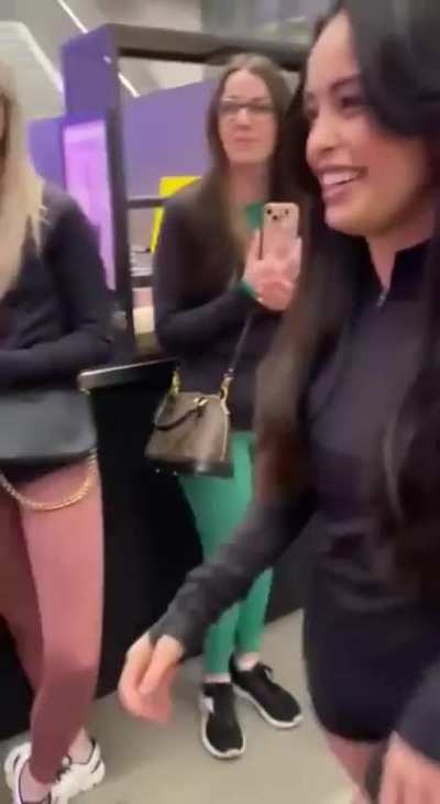 Rae getting filmed walking away