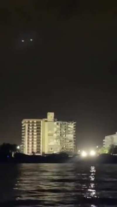 POV from sea of Champlain Towers South Demolition 7/4/2021